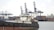 A busy shipping port with vessels and cranes, illustrating the dynamic marine industry.