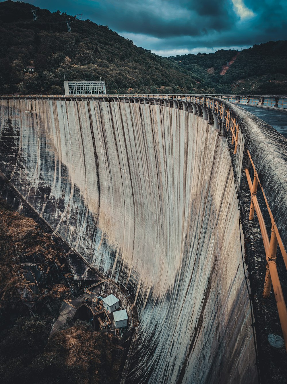 brown wooden bridge over river