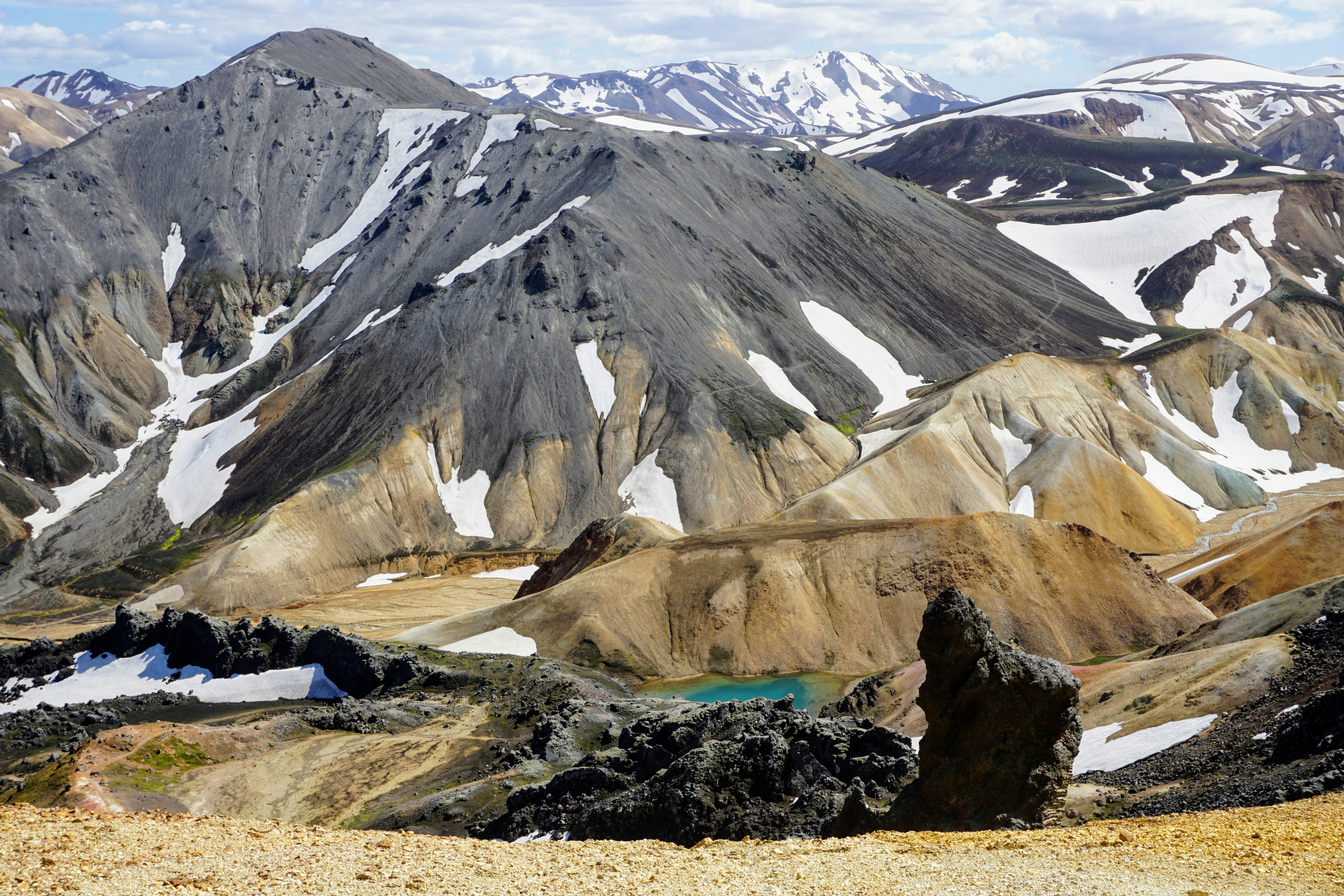 gray and white mountain under white sky during daytime wanderer teams background