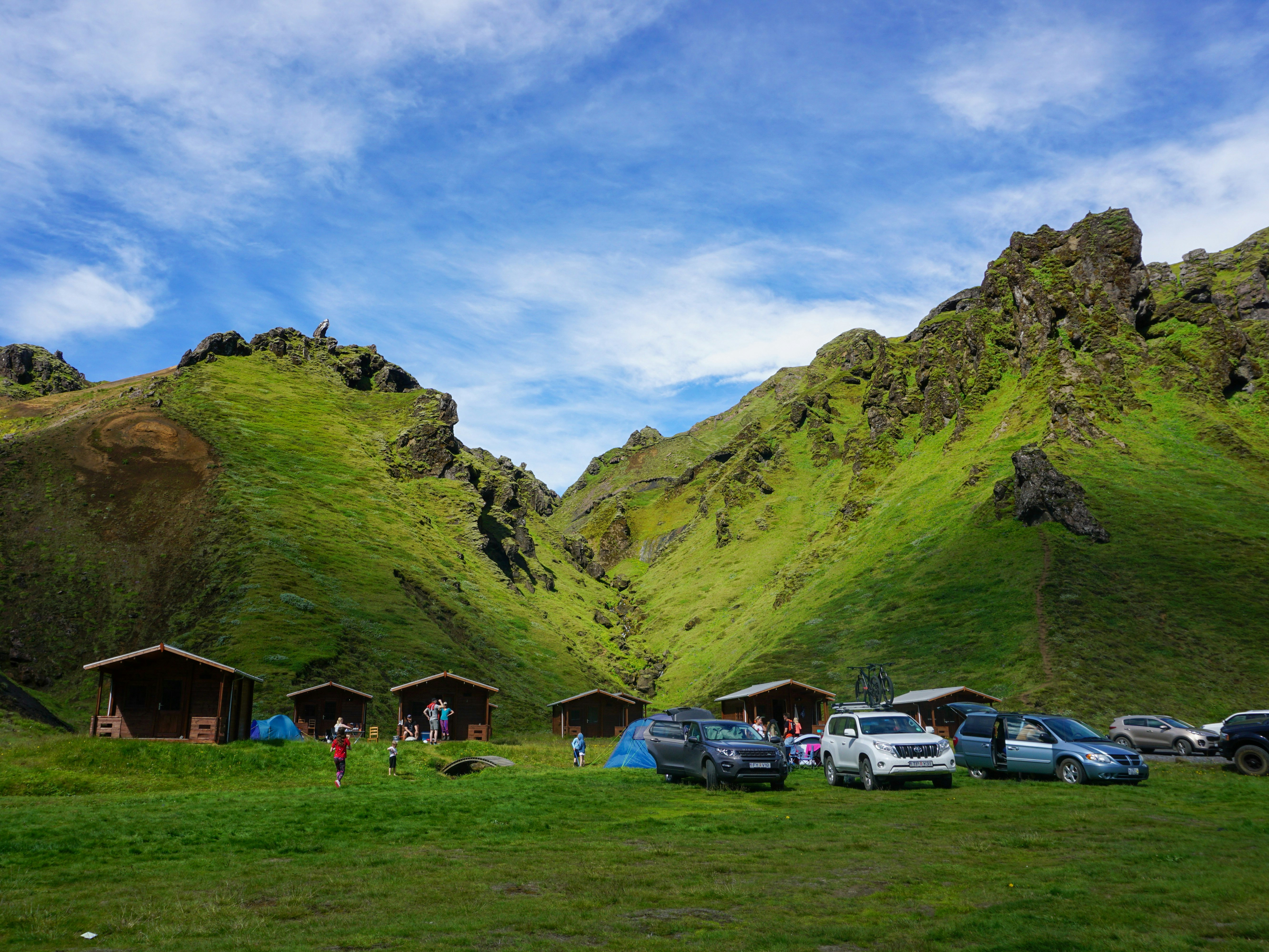 green and brown mountains under blue sky during daytime