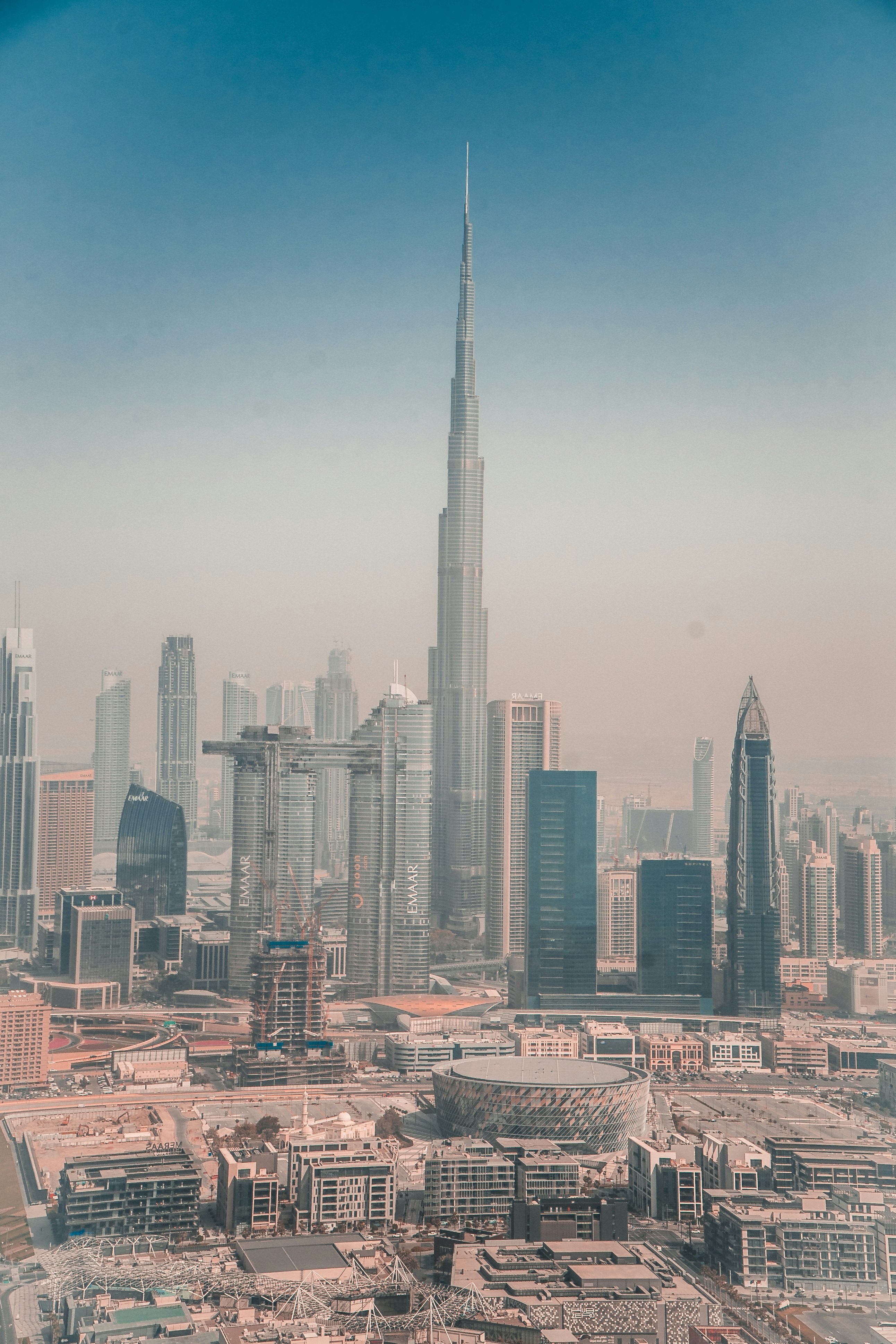 city skyline under blue sky during daytime