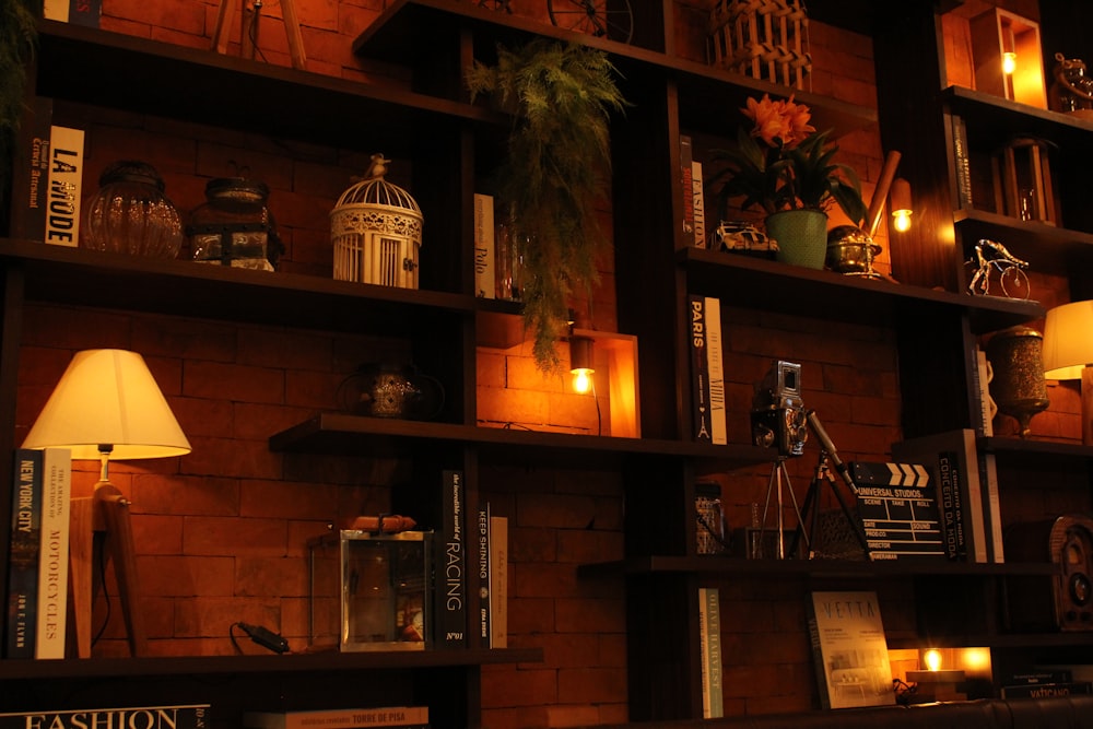brown wooden shelf with candle