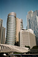white and gray high rise buildings