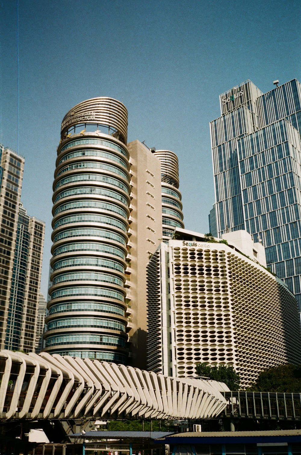 white and gray high rise buildings