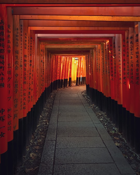 red and black wooden hallway in Fushimi Inari Taisha Shrine Senbontorii Japan
