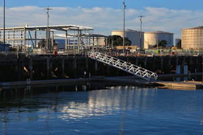 View of a completed waterproof basin at the Port of Dakhla Atlantique under bright daylight.