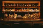 brown wooden shelf with bottles