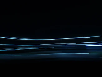 Abstract light trails symbolizing fast data flow and cutting-edge technology.