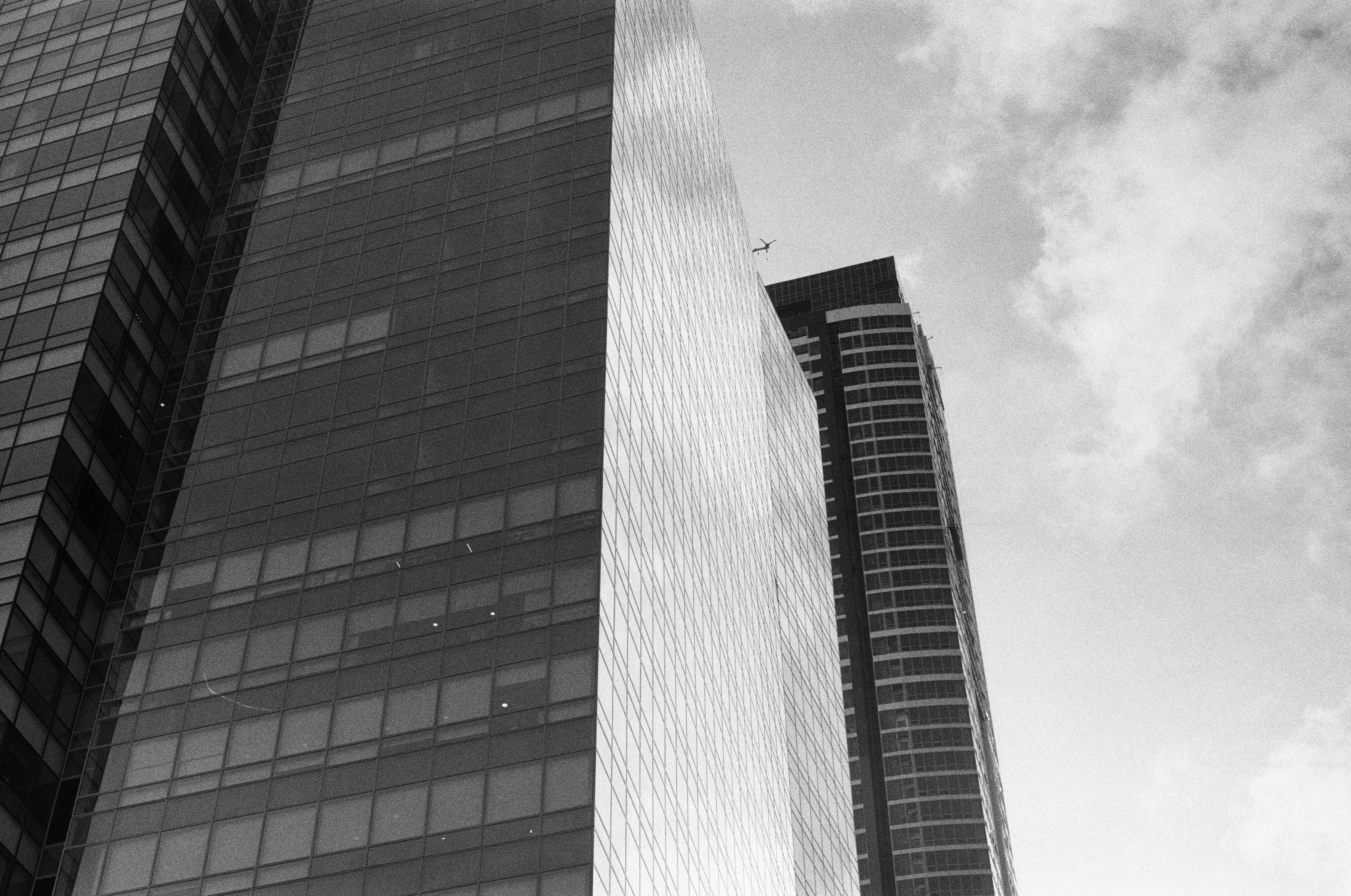 grayscale photo of high rise building