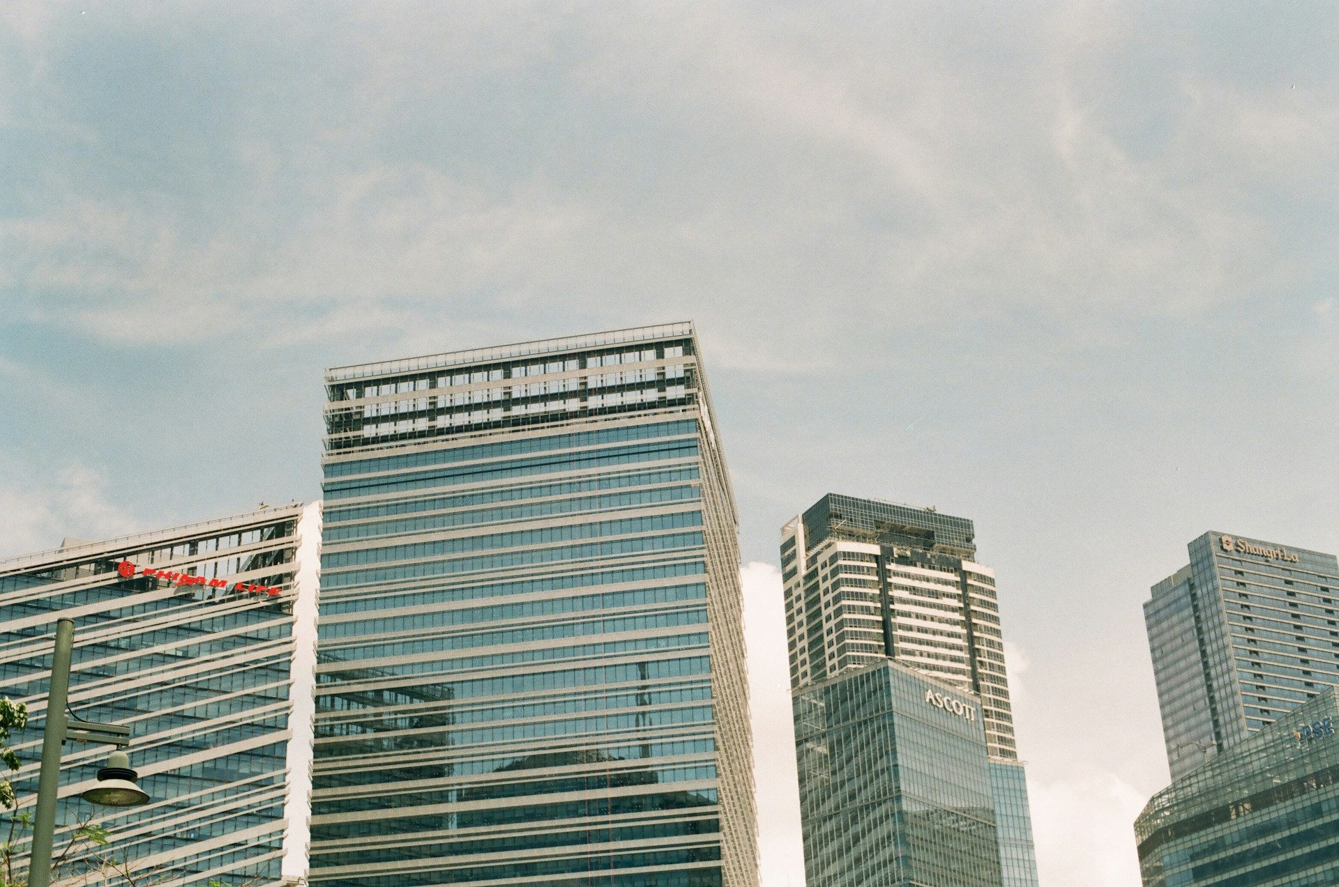 white and blue high rise building