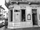 Historic black-and-white photo of Barocco’s original storefront on North Main Street, Fairport, circa 1914.
