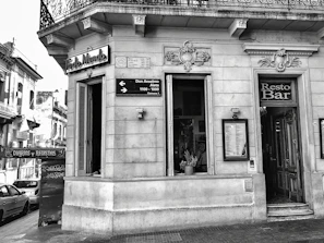 Historic black-and-white photo of Barocco’s original storefront on North Main Street, Fairport, circa 1914.
