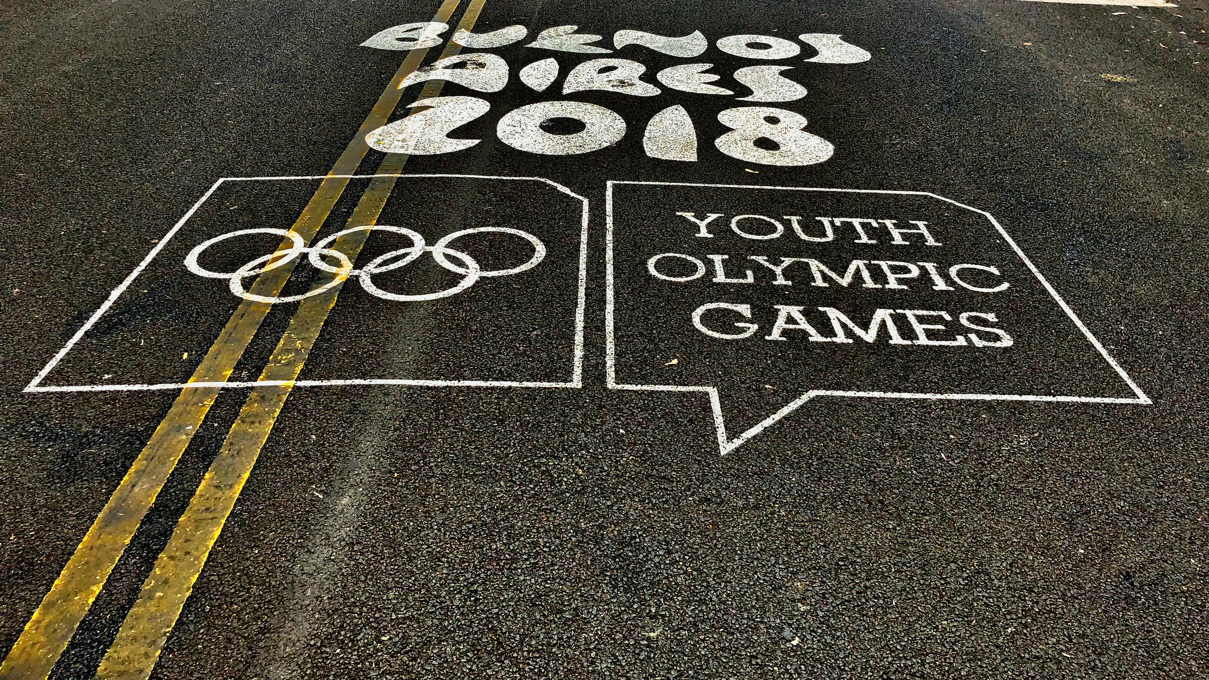 black and white bicycle lane road sign
