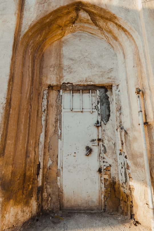 brown wooden window frame during daytime in Ahvaz Iran