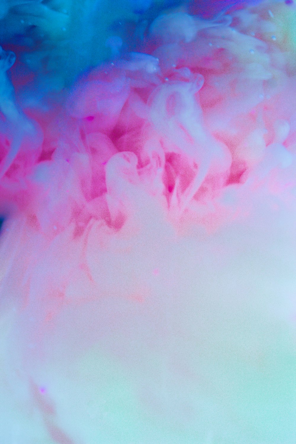 pink smoke on blue background
