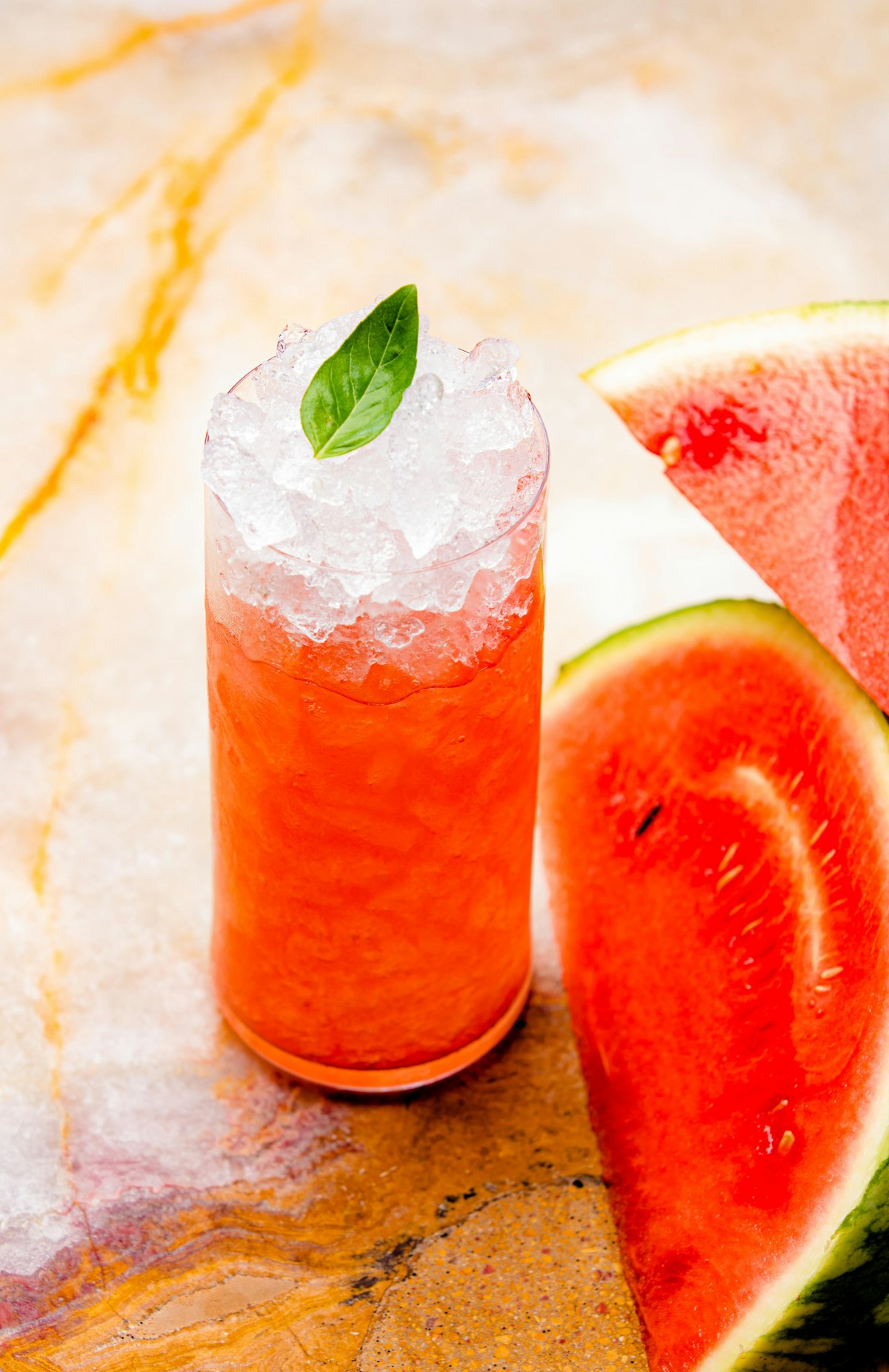 Watermelon lemonade with crushed ice and basil