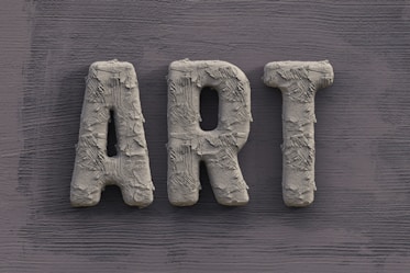 gray concrete cross on black textile