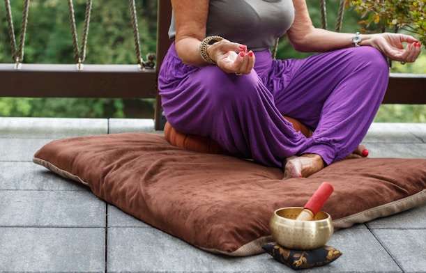 Person managing wellness with mindfulness and a balanced lifestyle amidst a busy schedule