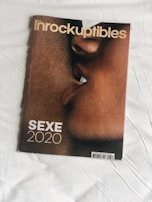 Close-up of two faces in profile with lips nearly touching, suggesting intimacy. The cover features the title 'Les Inrockuptibles' at the top and the words 'SEXE 2020' in bold at the bottom.