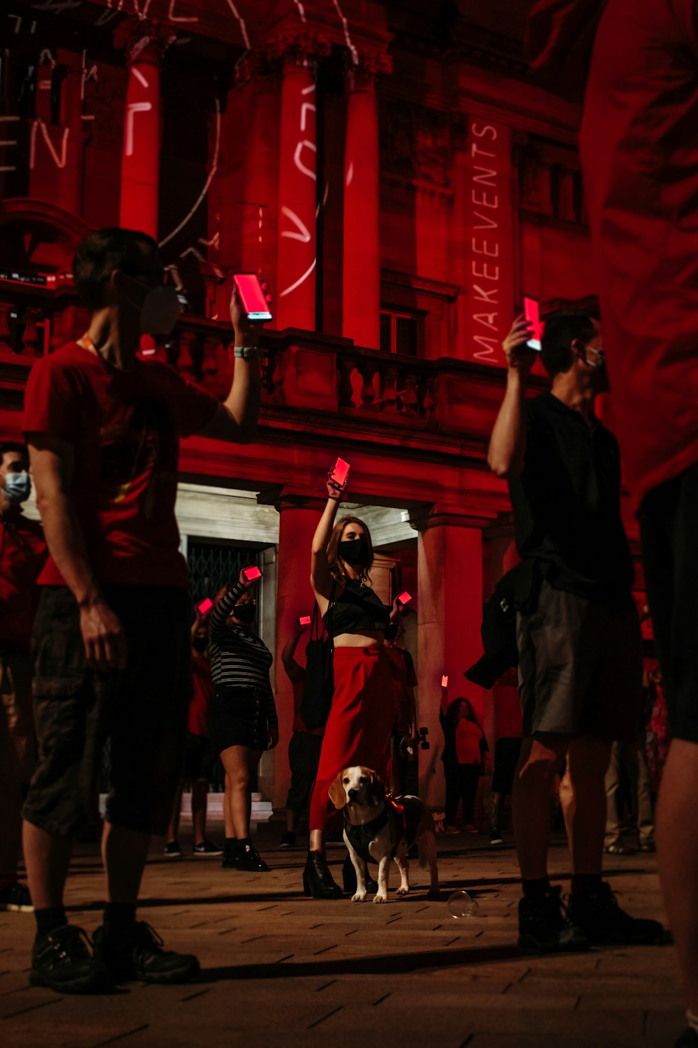 group of men in black and red shirts