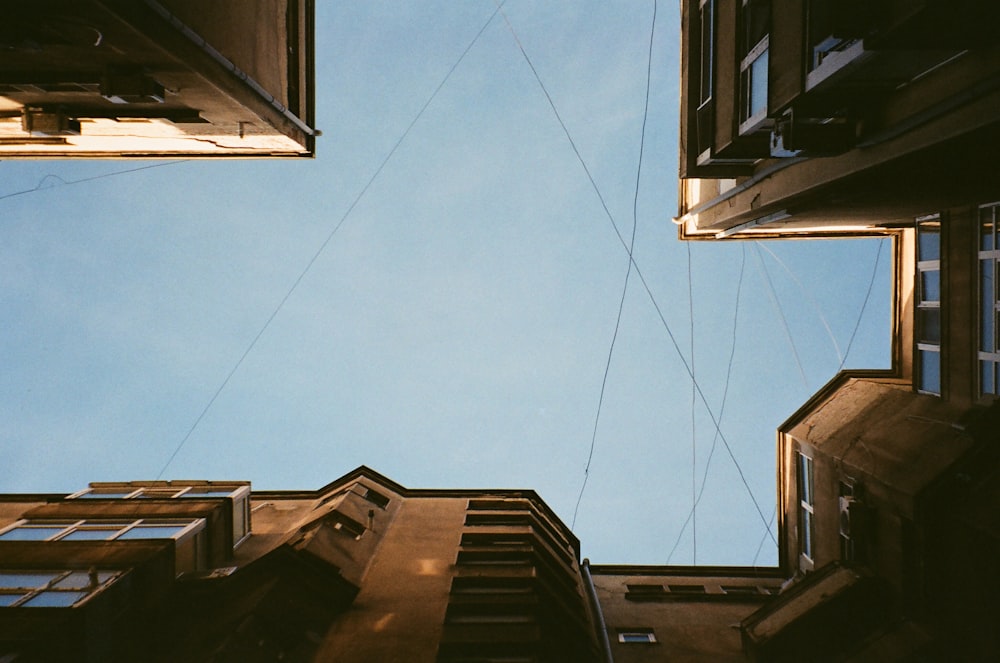 brown wooden house under blue sky during daytime