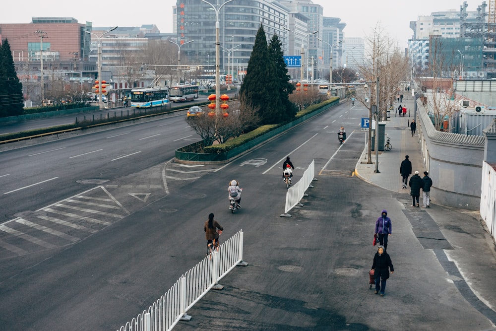 people walking on the street during daytime