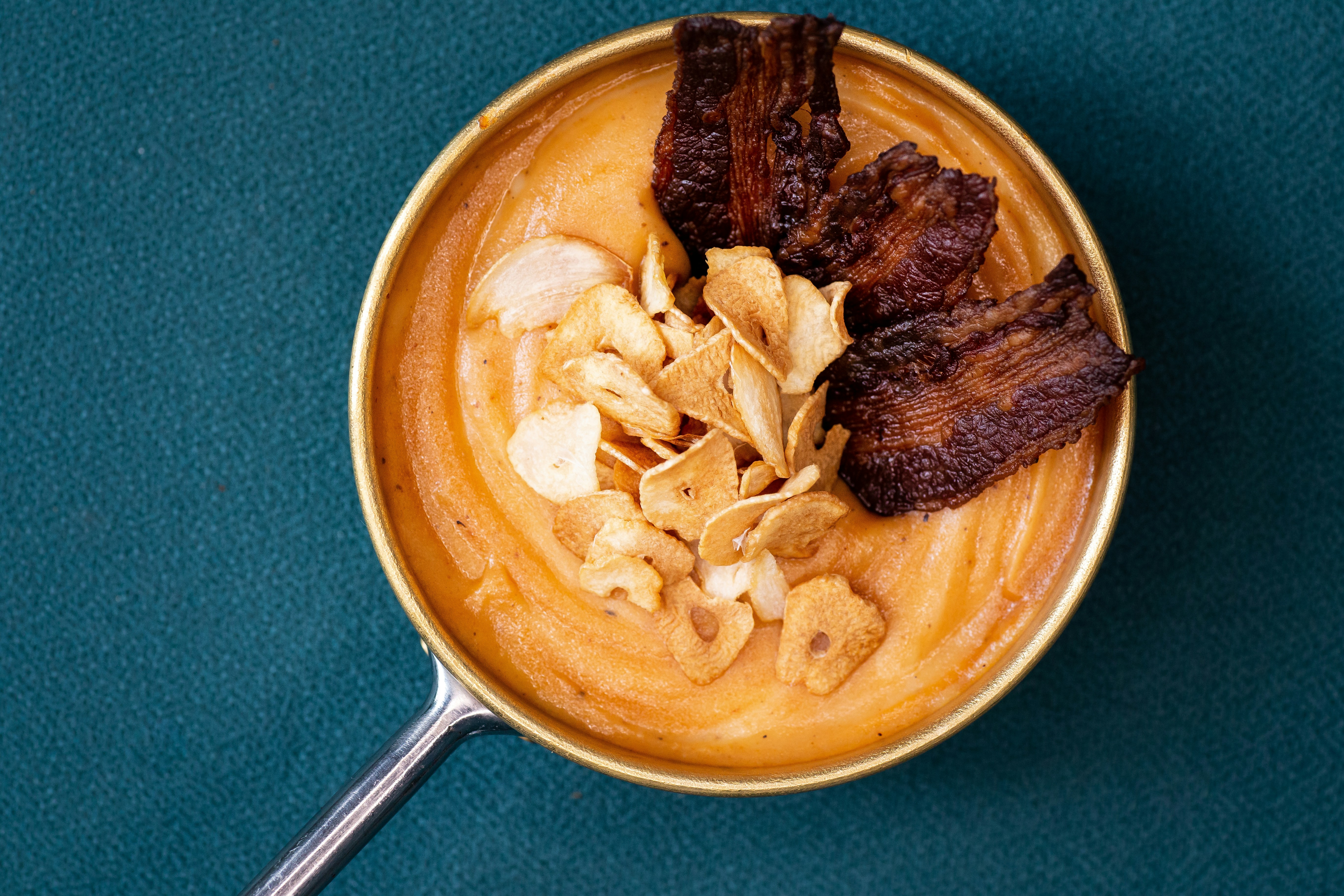 brown and white food on brown ceramic bowl