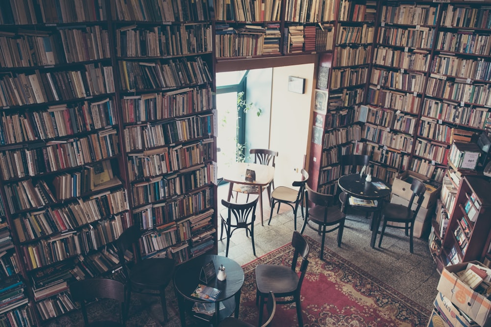 brown wooden shelf near white wall