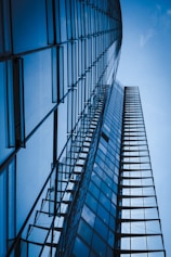 low angle photography of glass walled building