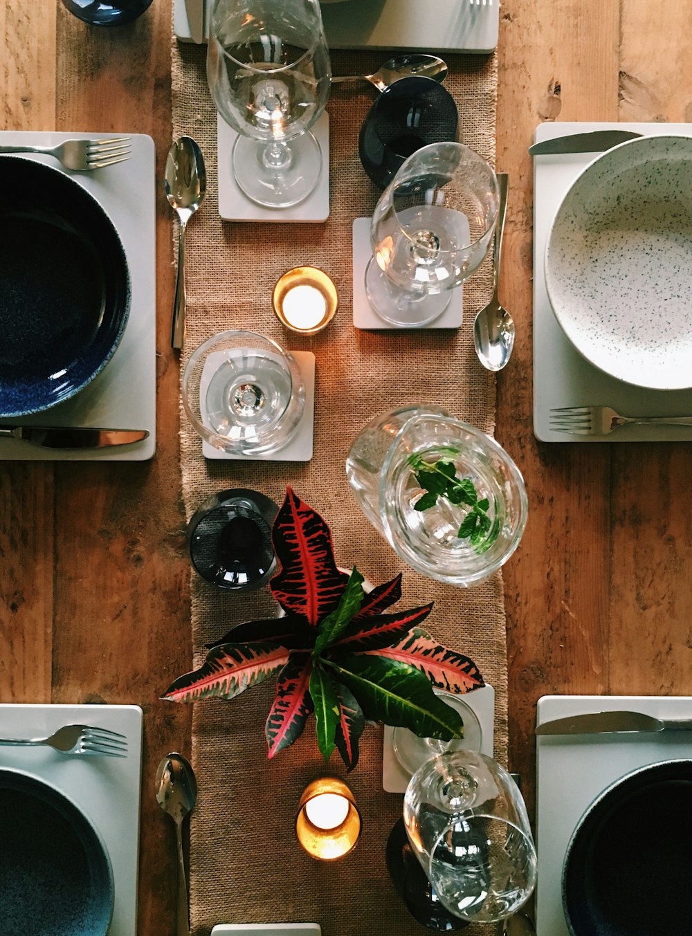 clear drinking glass on brown wooden table