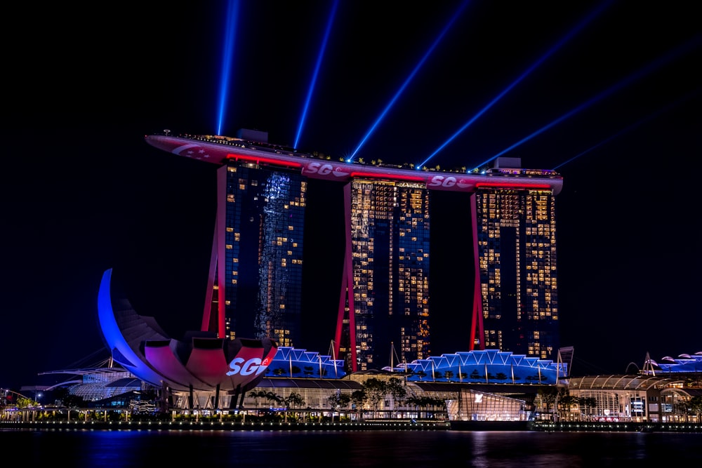 purple lighted bridge during night time