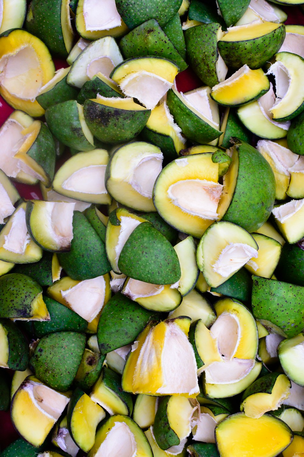 sliced fruits on green fruit