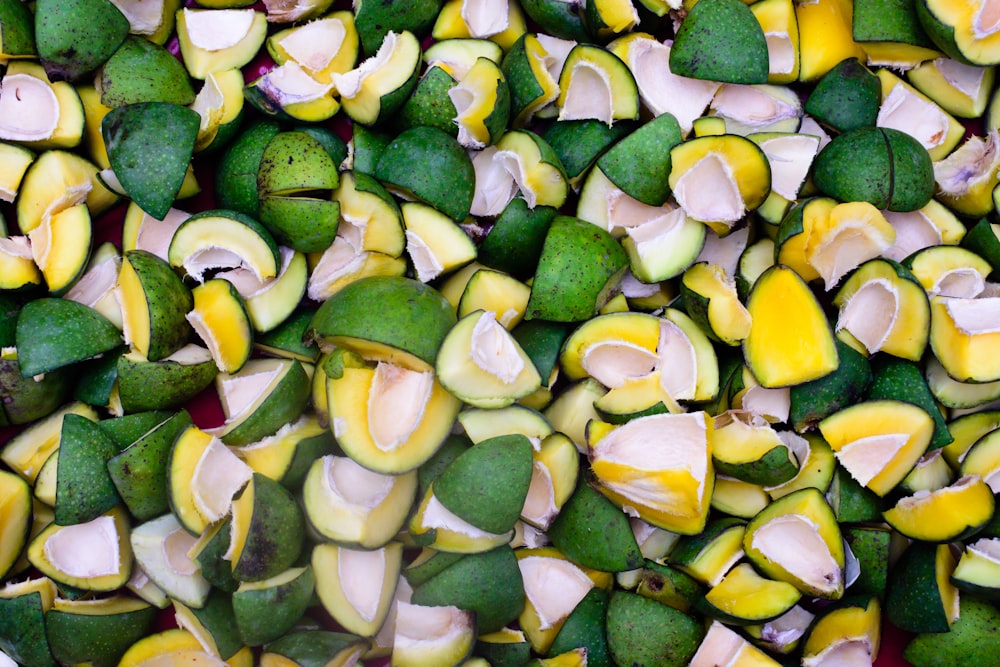 sliced green fruits on green leaves