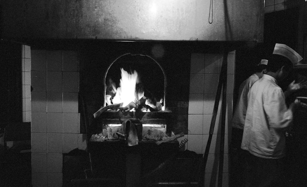 fire in black fireplace in room