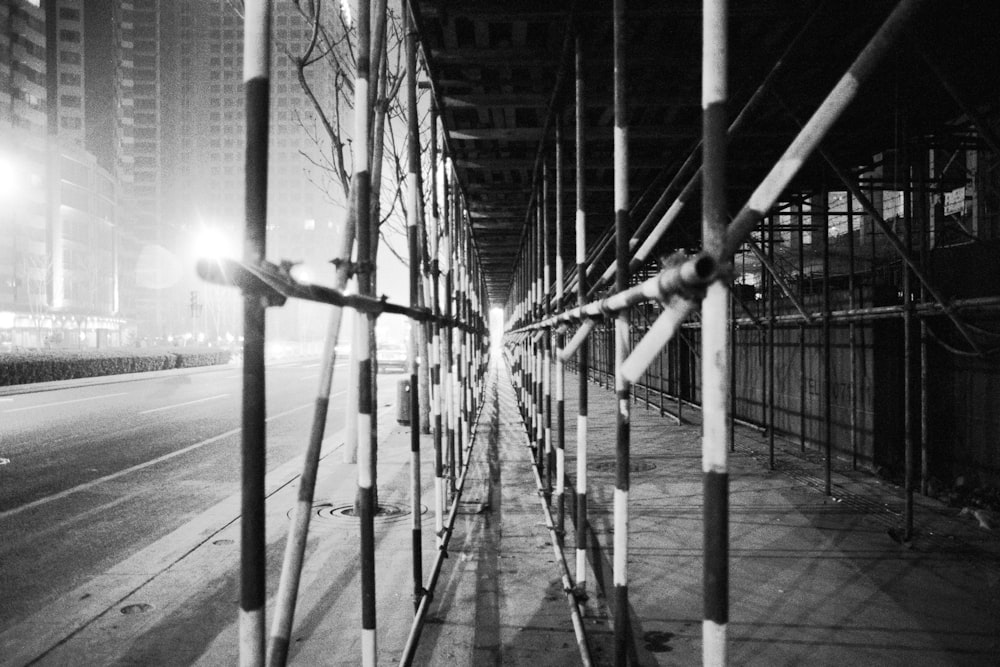 grayscale photo of a bridge