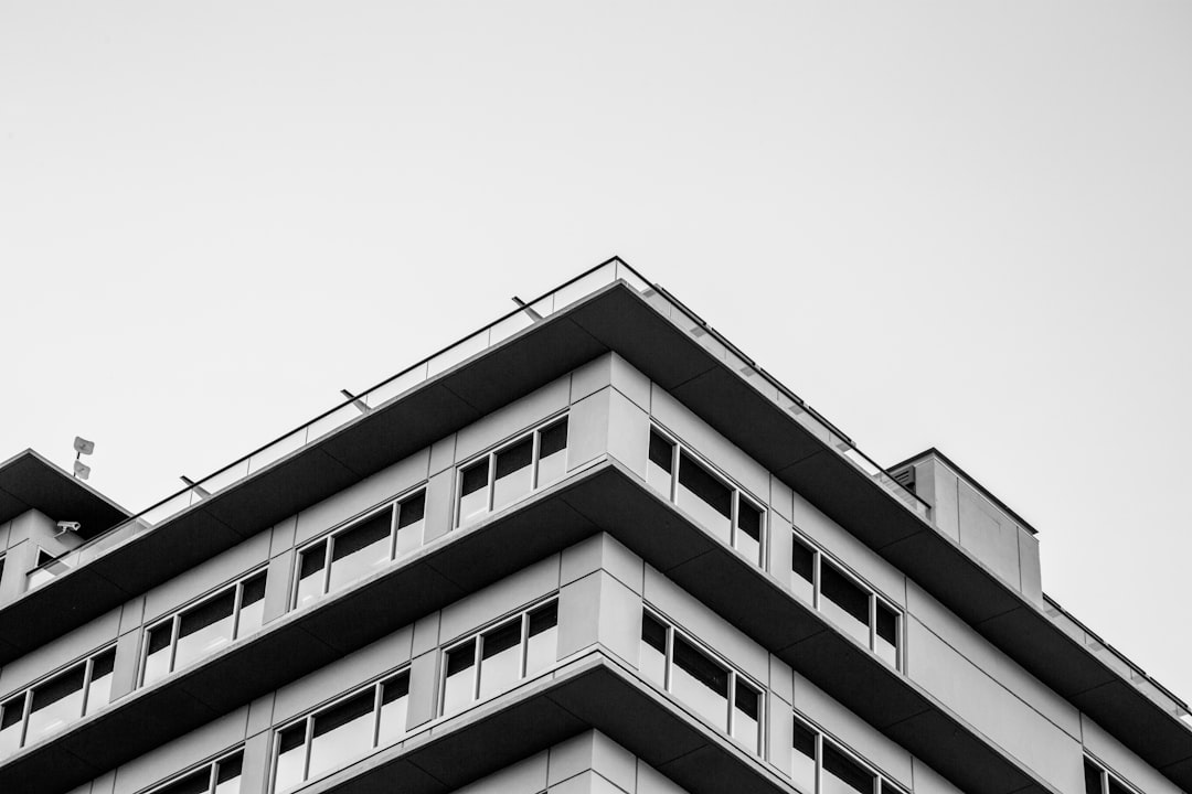 grayscale photo of concrete building,