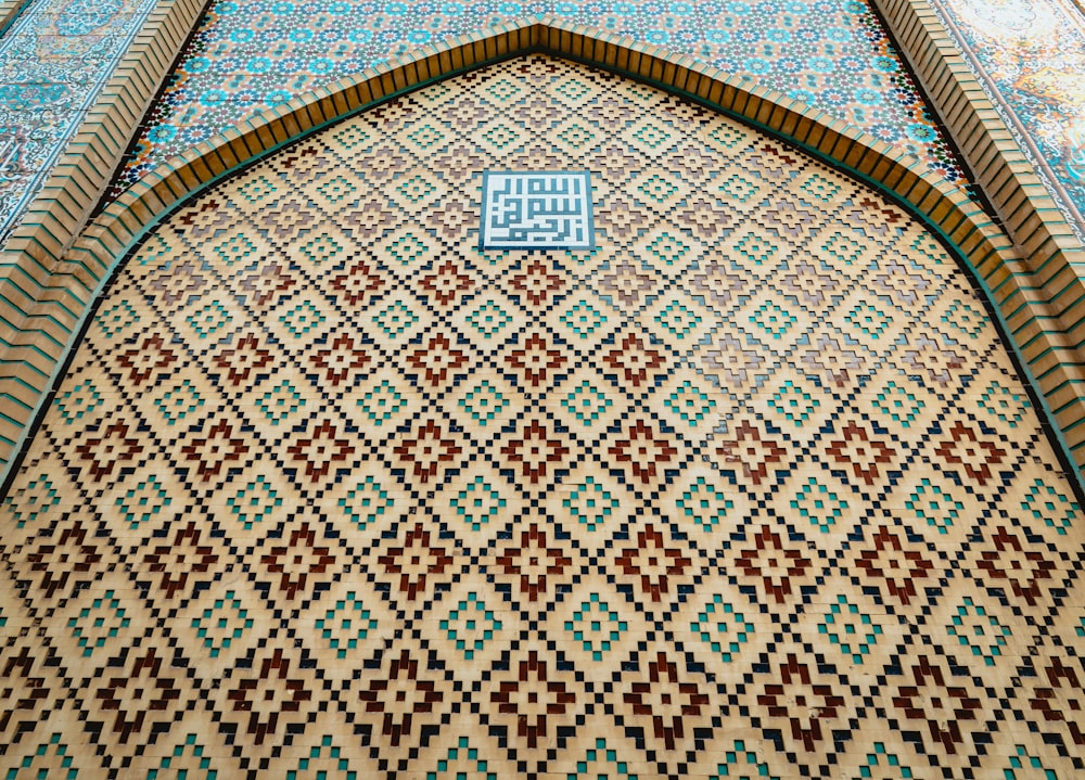 blue white and brown floral textile