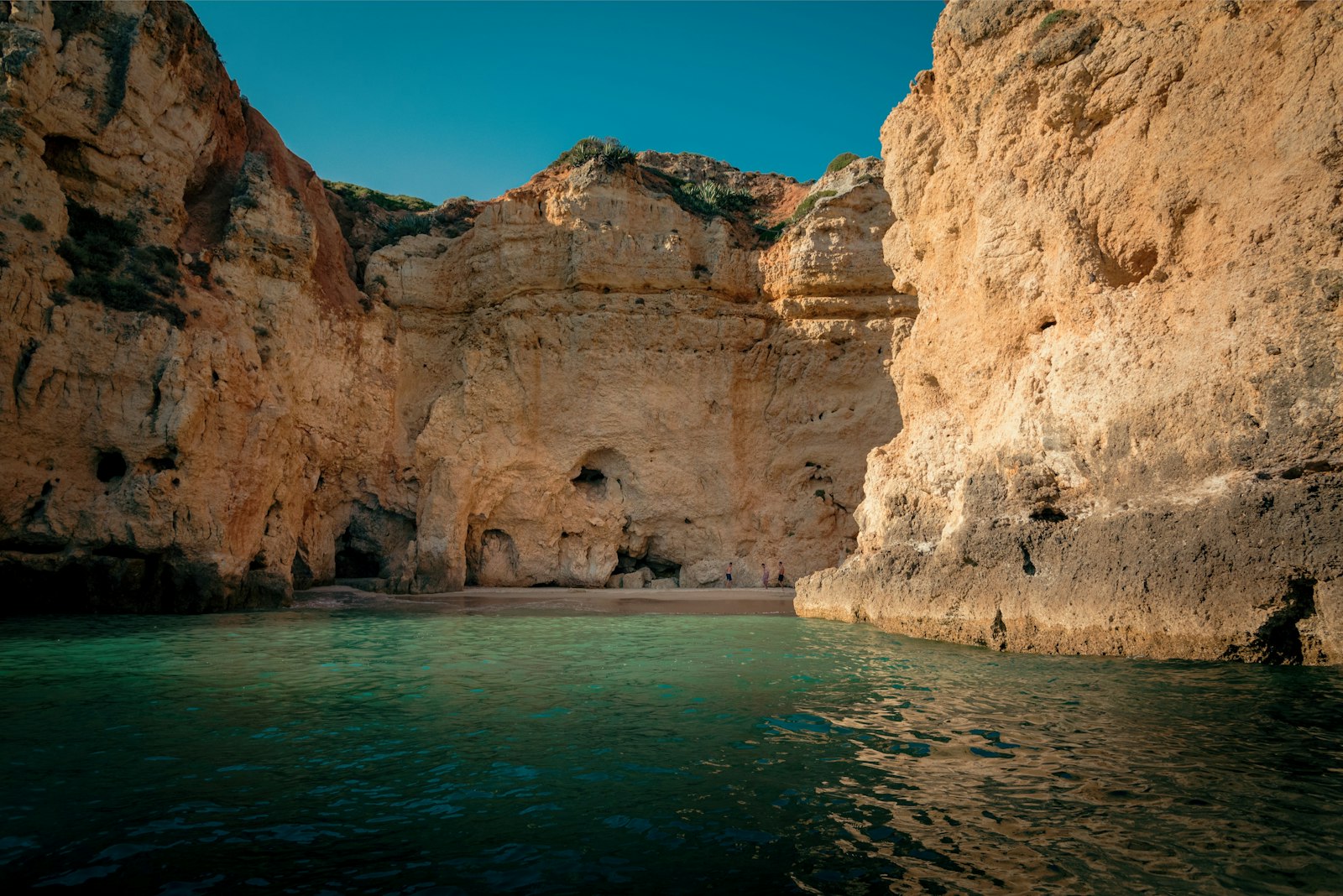 Golden sea cliffs and a sheltered cove at Ponta da Piedade near Lagos in the Algarve