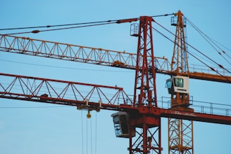 red and white crane during daytime