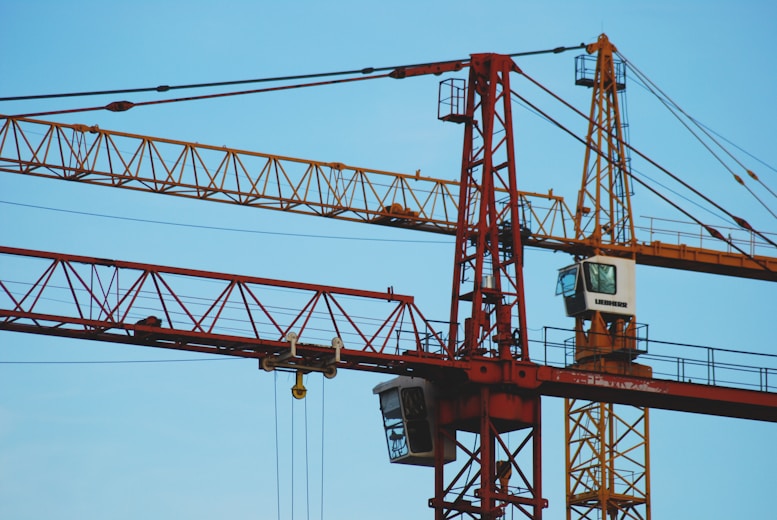 red and white crane during daytime