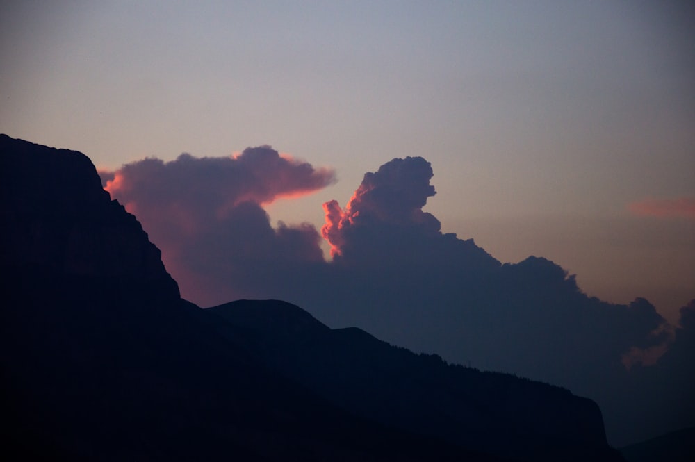 silhouette of mountain during sunset