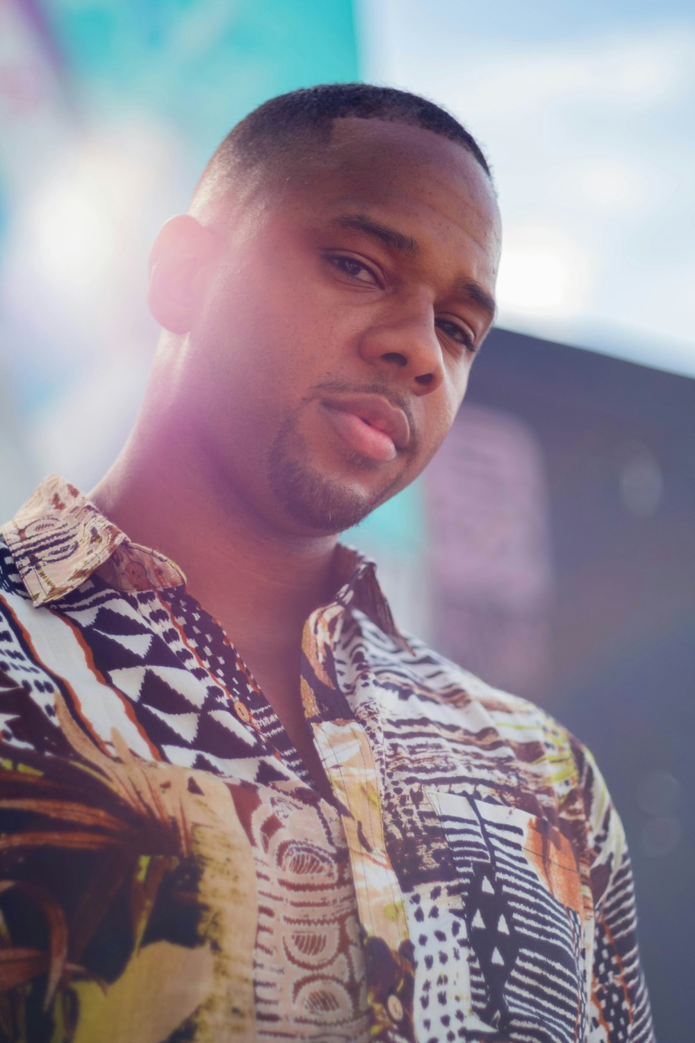 man in white black and yellow button up shirt