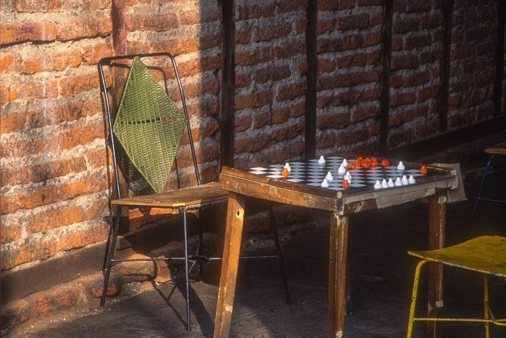 brown wooden table with chairs