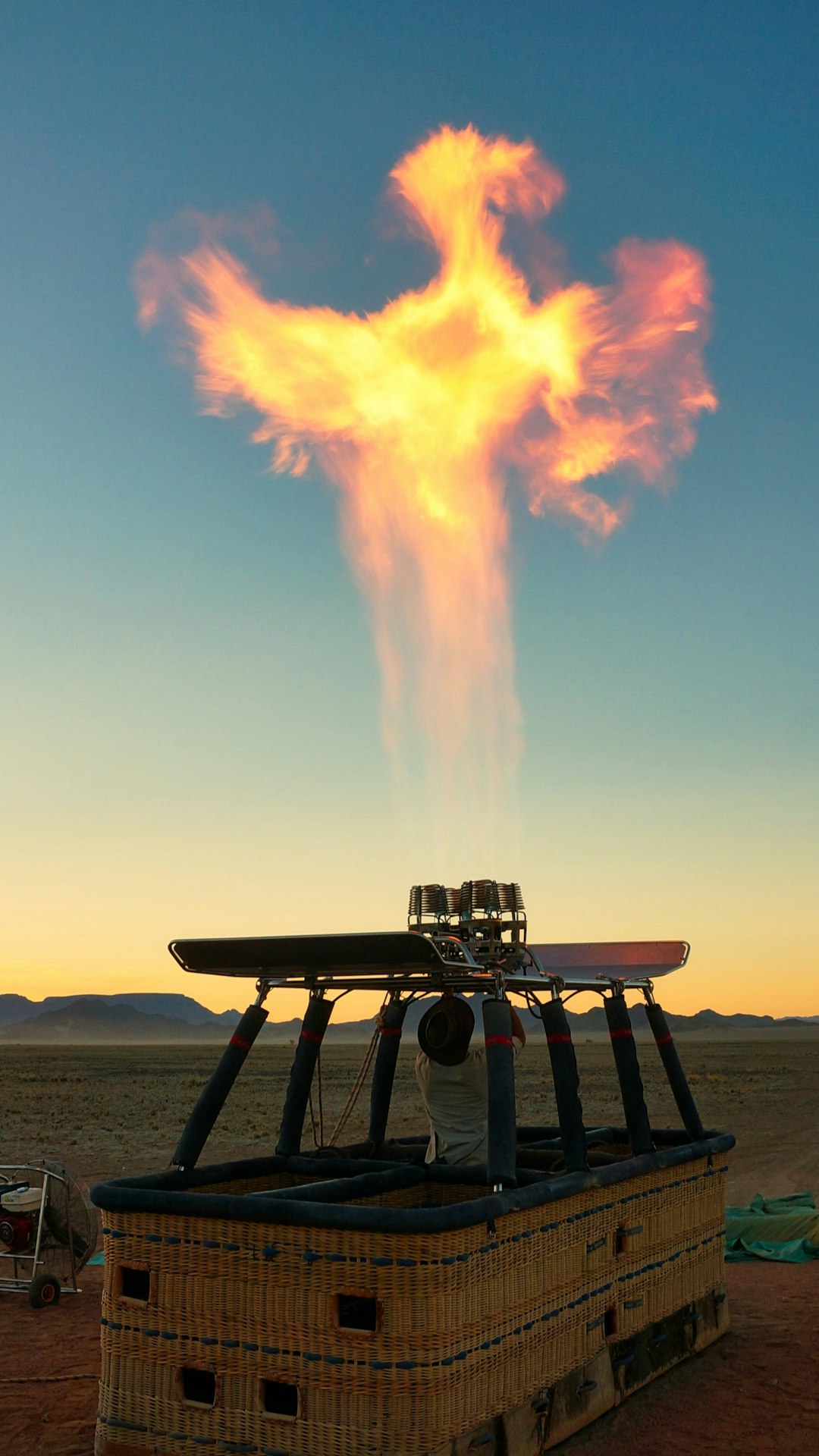 fire on brown wooden table during daytime