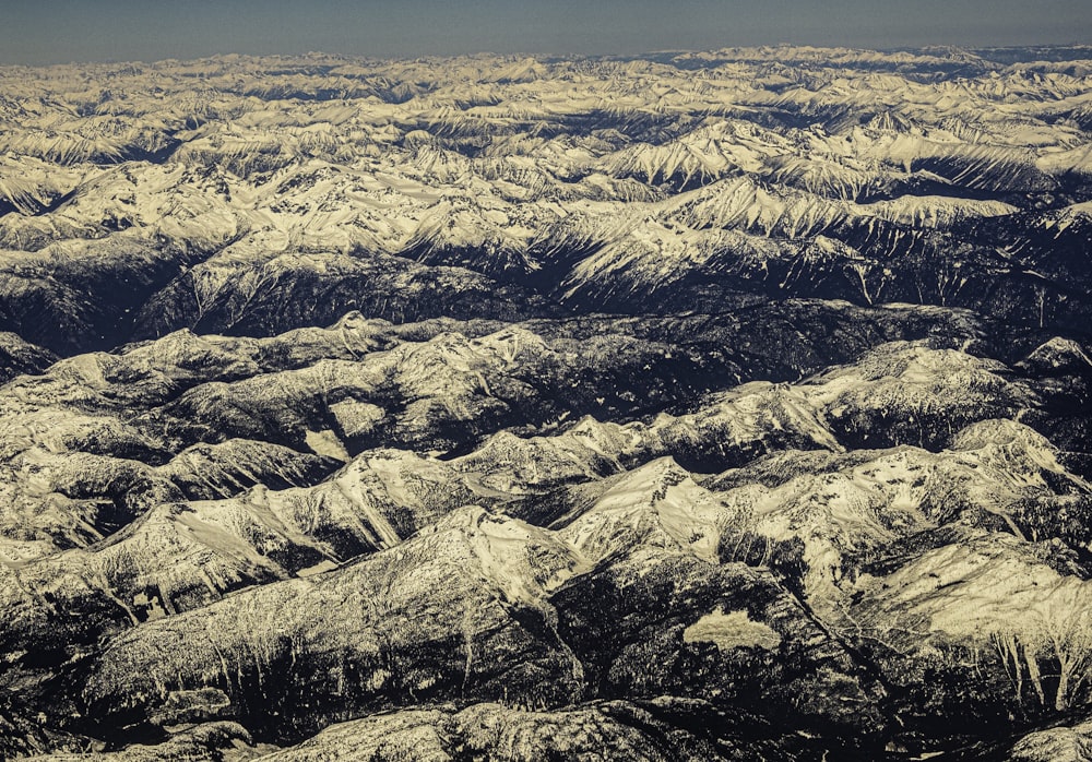 snow covered mountain during daytime