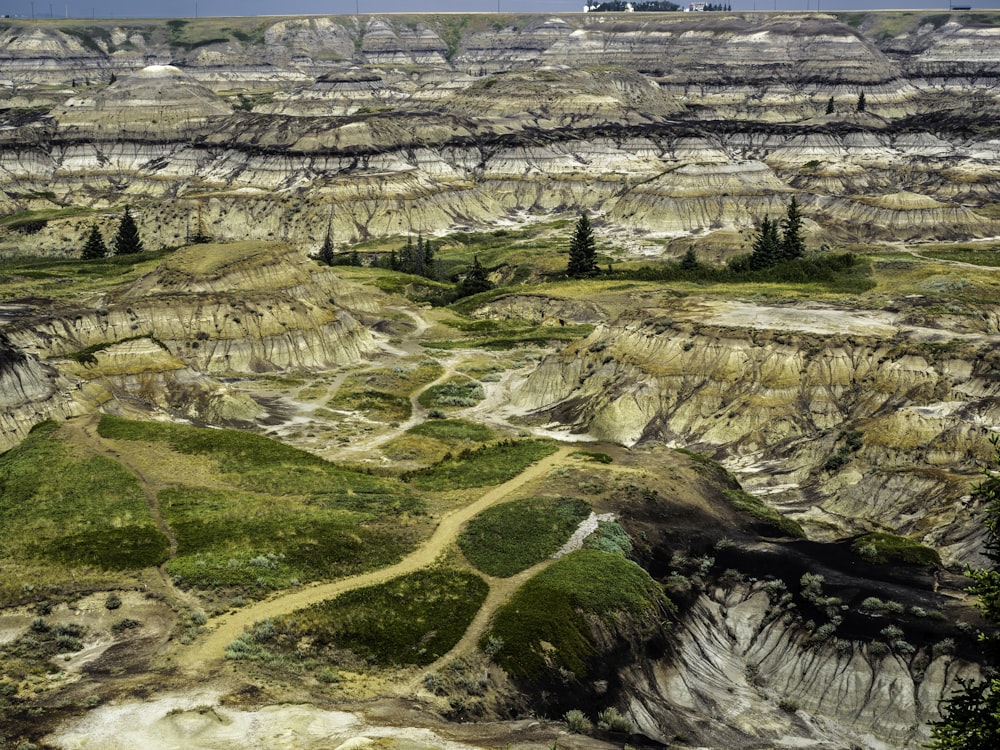 aerial view of green and brown mountains during daytime