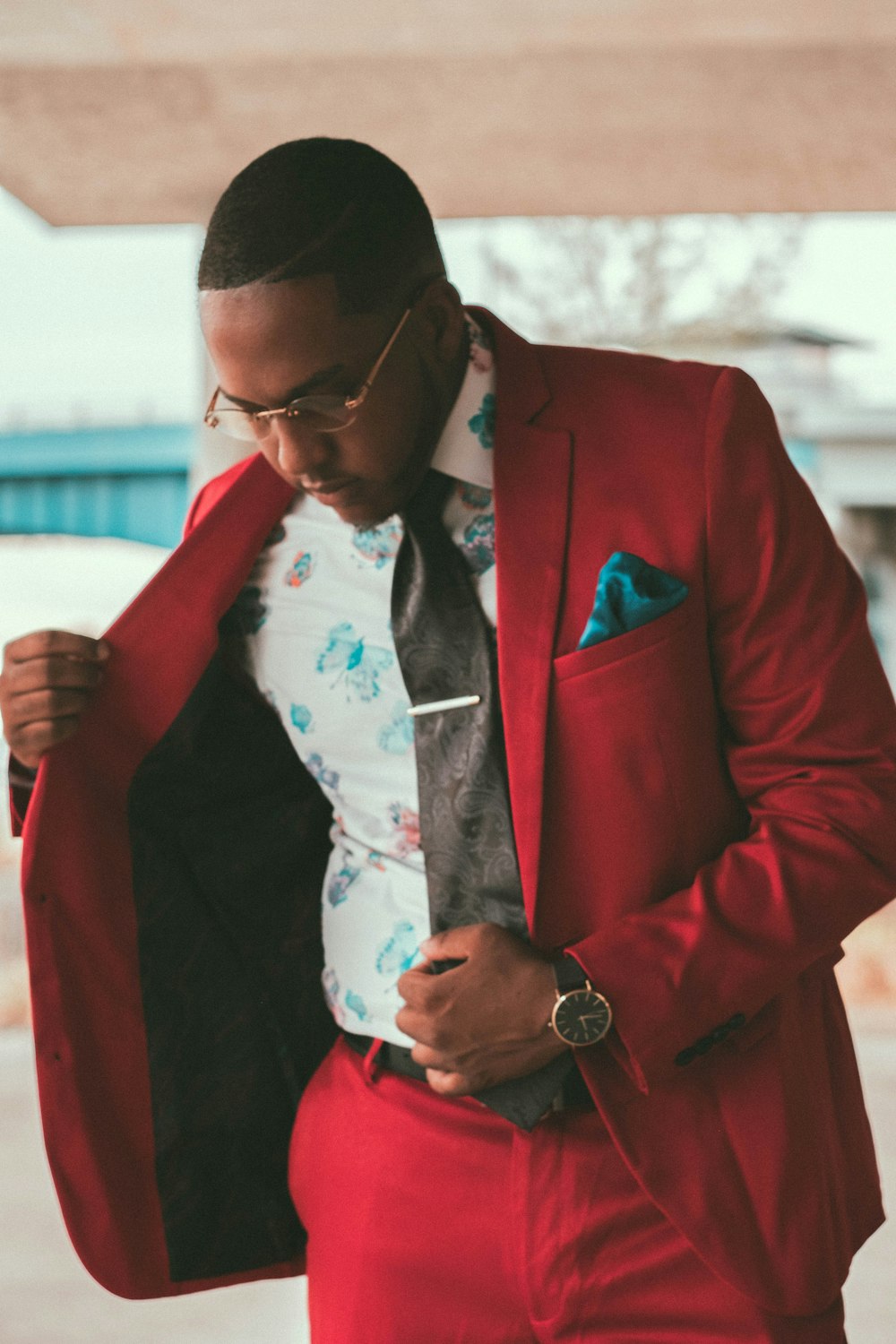 man in red blazer and white dress shirt