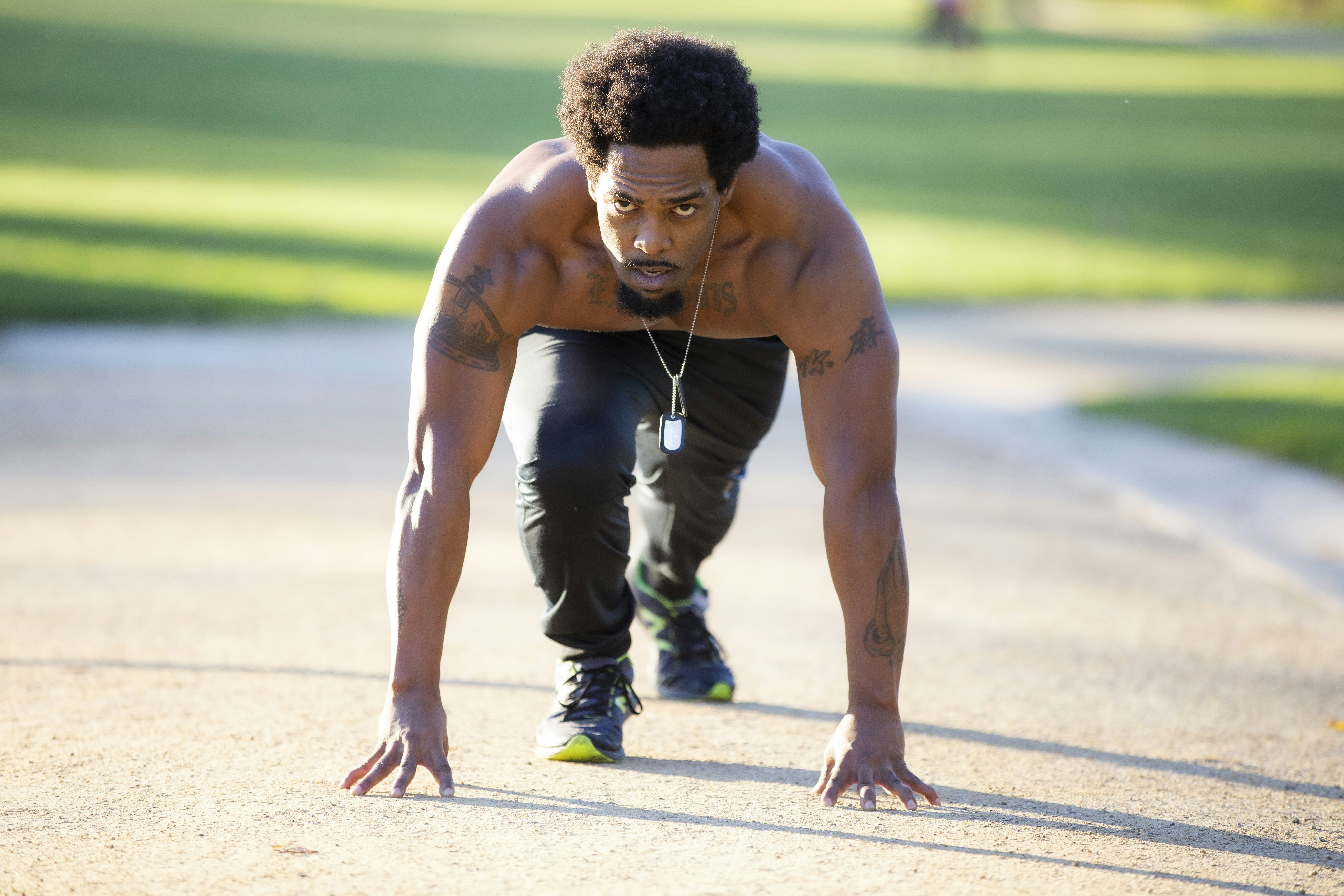 Athlete doing outdoor calisthenics