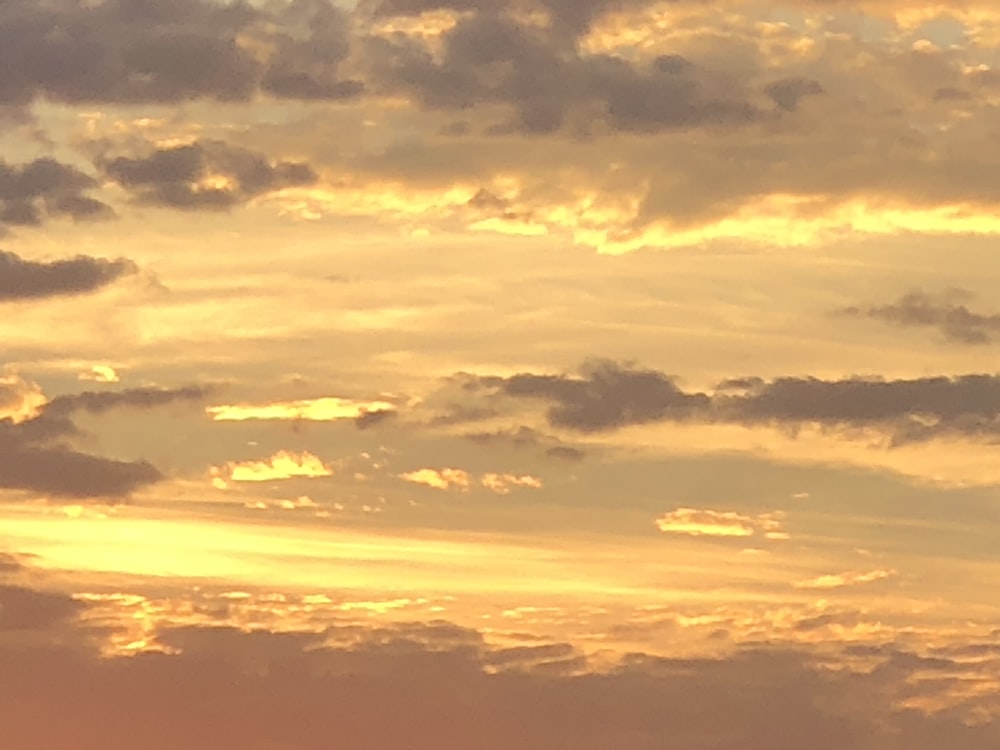 clouds and sun in sky