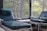 A serene consultation room with a comfortable chair and a small table.